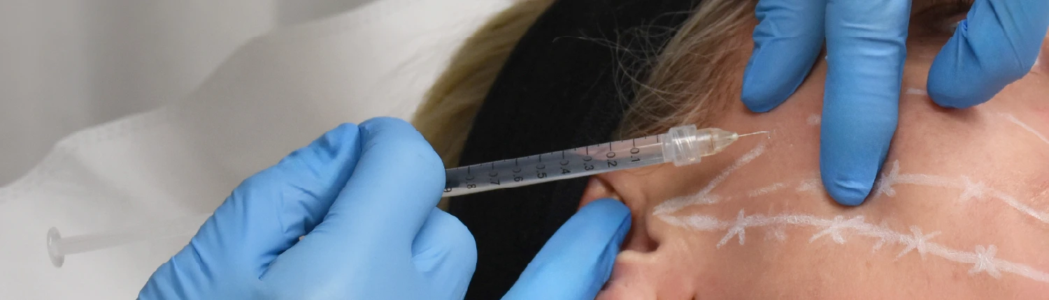 Teneale injecting Botox
